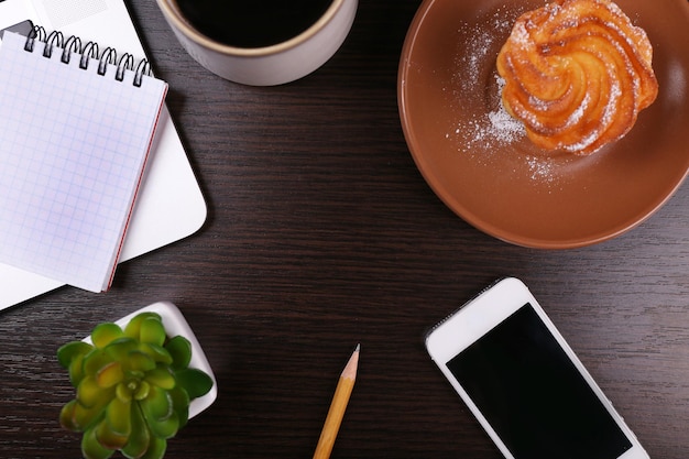 Contact desk with notebook and phone